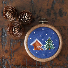 Load image into Gallery viewer, Snowy Ski Lodge Cross Stitch Christmas Ornament – Navy Blue 3&quot; Cross Stitch Decoration
