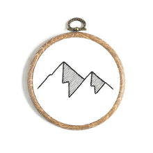 Load image into Gallery viewer, Geometric mountain design embroidered in black on white fabric
